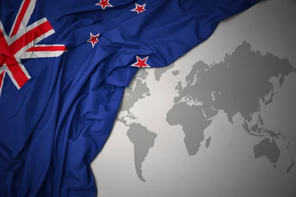 Agitant Drapeau National Coloré Nouvelle Zélande Sur Fond Carte Monde — Photo