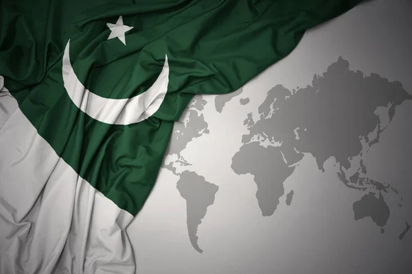 Waving Colorful National Flag Pakistan Gray World Map Background — Stock Photo, Image