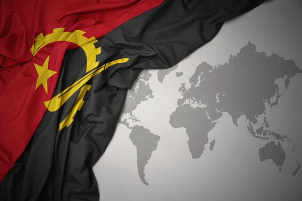 Waving Colorful National Flag Angola Gray World Map Background — Stock Photo, Image