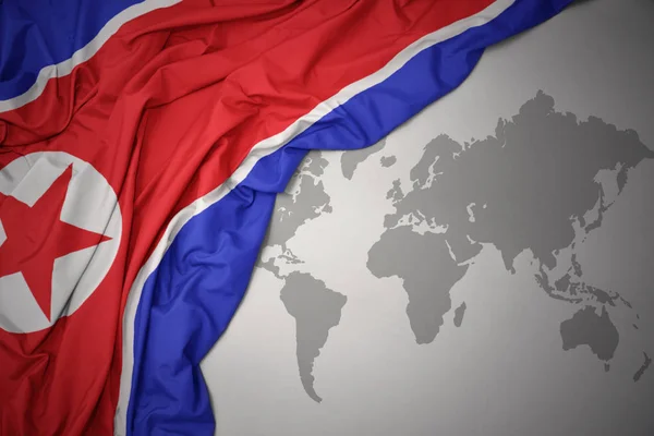 Waving Colorful National Flag North Korea Gray World Map Background — Stock Photo, Image