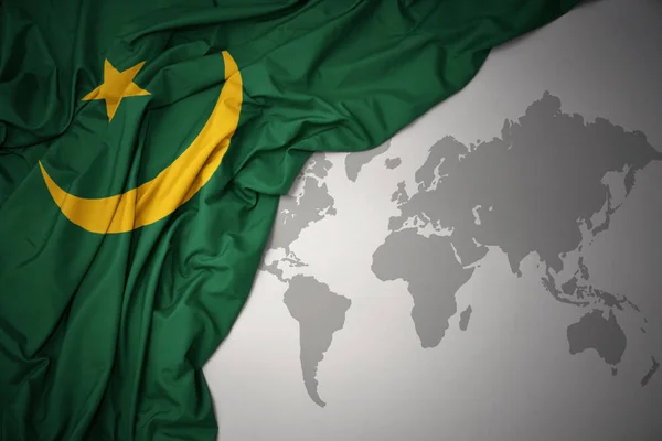 Waving Colorful National Flag Mauritania Gray World Map Background — Stock Photo, Image