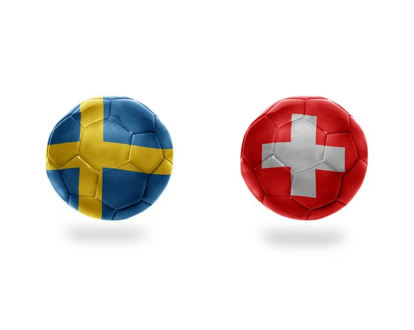 Balles de football avec drapeaux nationaux de Suède et de Suisse . — Photo