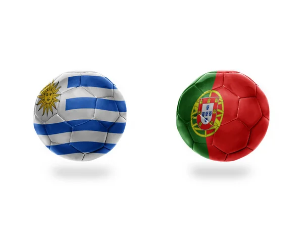 Ballons de football avec des drapeaux nationaux de portugais et uruguay . — Photo