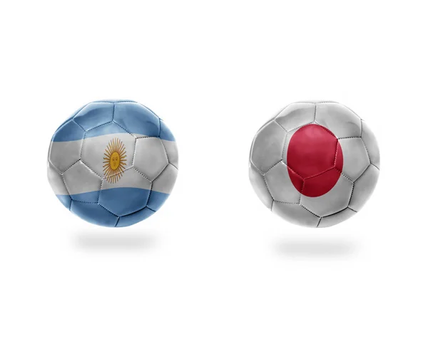 有阿根廷和日本国旗的足球球 在白色背景上被隔离 — 图库照片