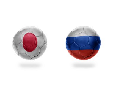 futbol topları ile Japonya ve russia.isolated beyaz zemin üzerine Ulusal bayrakları. 3D çizim