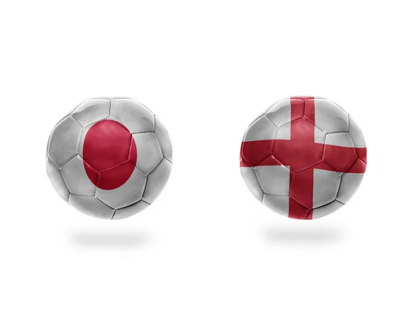 Fußballbälle Mit Den Nationalflaggen Japans Und Englands Auf Weißem Hintergrund — Stockfoto