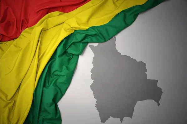 Waving Colorful National Flag Bolivia Gray Map Background — Stock Photo, Image