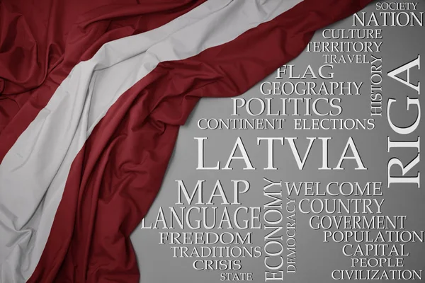 Macha kolorowa Flaga narodowa Łotwy na szarym tle z ważnych słów o kraju — Zdjęcie stockowe