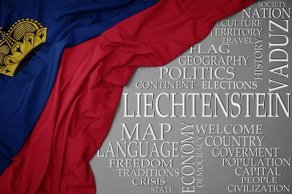 Macha kolorowe flagi narodowej Liechtensteinu na szarym tle z ważnych słów o kraju — Zdjęcie stockowe