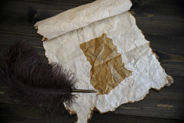 Map of ghana on vintage paper with old pen on the wooden texture desk — Stock Photo, Image