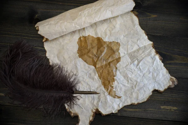 Map of south america on vintage paper with old pen on the wooden texture desk — Stock Photo, Image