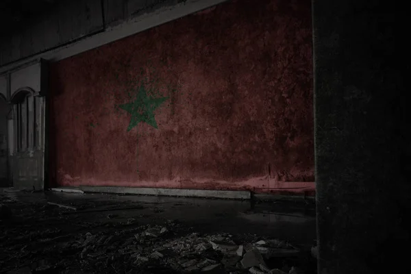 Painted flag of morocco on the dirty old wall in an abandoned ruined house. — Stock Photo, Image