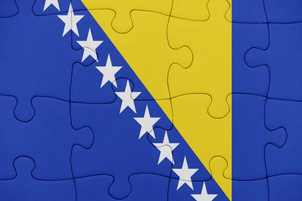 Rompecabezas con la bandera nacional de Bosnia y Herzegovina . —  Fotos de Stock