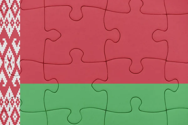 Puzzle with the national flag of belarus. — Stock Photo, Image