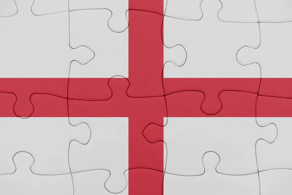 Puzzle with the national flag of england. — Stock Photo, Image