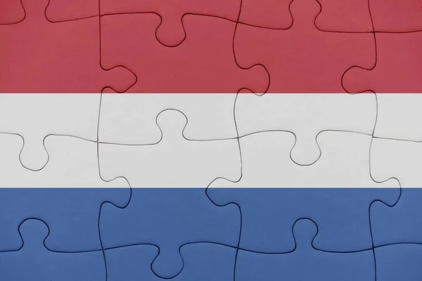 Puzzel met de nationale vlag van Nederland. — Stockfoto