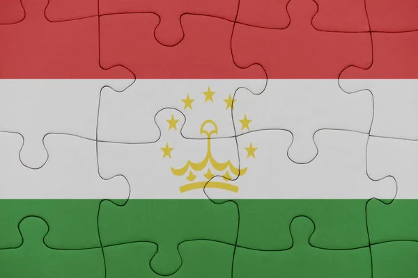 Tacikistan bayrağı ile bulmaca. — Stok fotoğraf