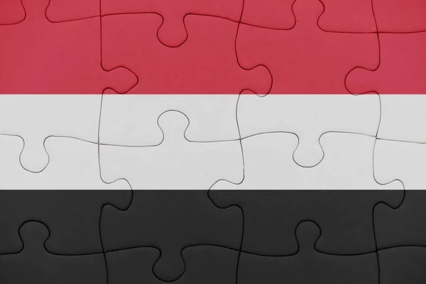 Puzzle s národní vlajkou Jemenu. — Stock fotografie