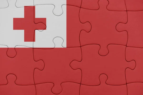 Puzzle with the national flag of Tonga. — Stock Photo, Image