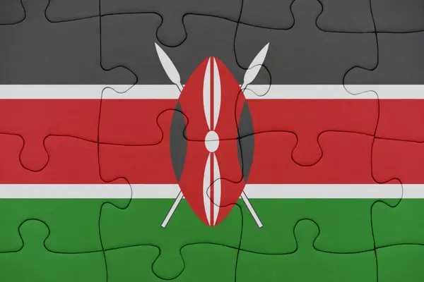 Puzzle mit der Nationalflagge Kenias. — Stockfoto
