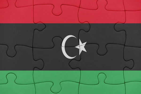 Puzzle with the national flag of libya. — Stock Photo, Image