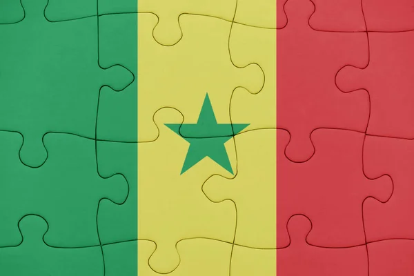 Puzzle with the national flag of senegal. — Stock Photo, Image