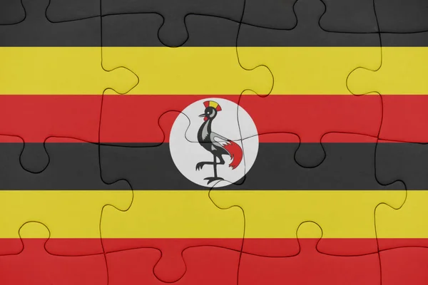 ウガンダの国旗を持つパズル. — ストック写真