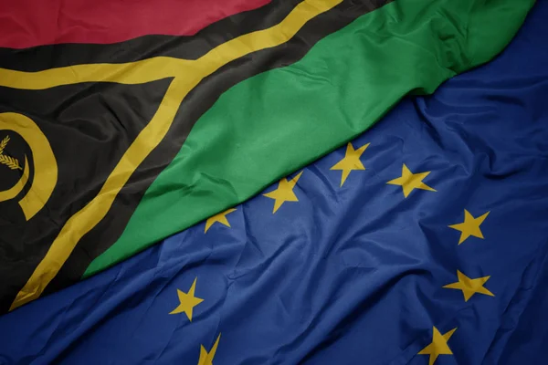 Avrupa Birliği ve Vanuatu bayrağı renkli bayrak sallayarak. — Stok fotoğraf