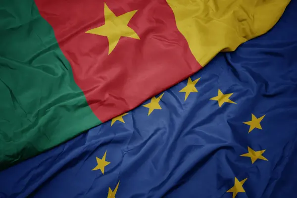 Waving colorful flag of european union and flag of cameroon. — Stock Photo, Image