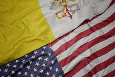 Amerika Birleşik Devletleri ve Vatikan ulusal bayrağı renkli bayrak sallayarak. Makro