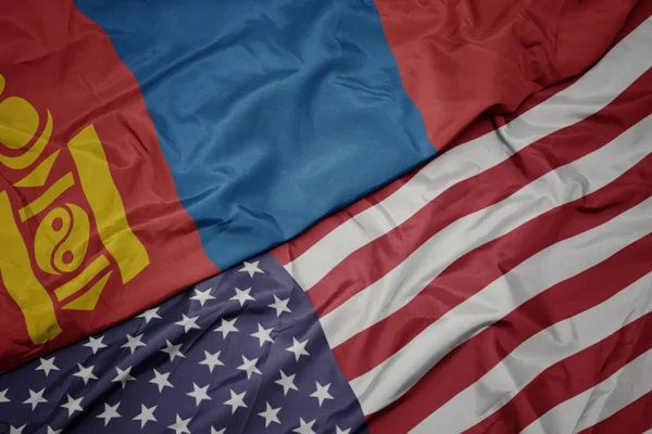 Amerika Birleşik Devletleri ve moğolistan ulusal bayrağı renkli bayrak sallayarak. — Stok fotoğraf