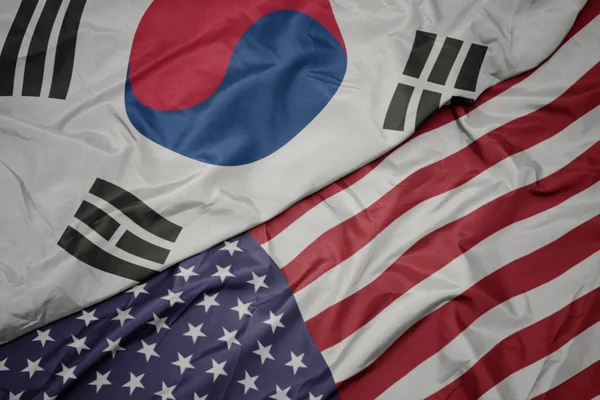 Waving colorful flag of united states of america and national flag of south korea. — Stock Photo, Image