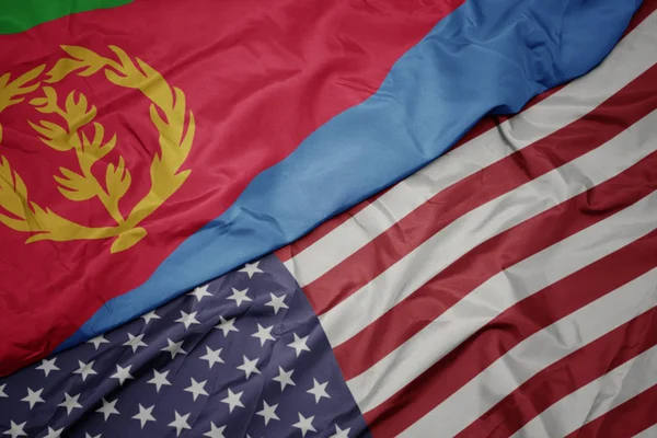 Waving colorful flag of united states of america and national flag of eritrea. — Stock Photo, Image