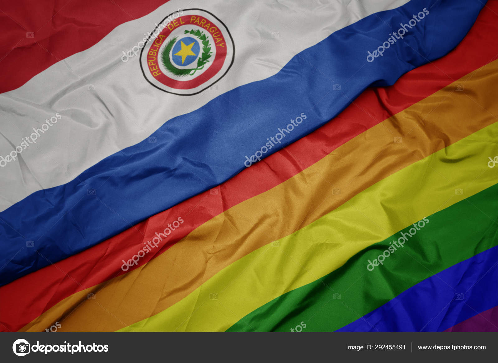 カラフルなゲイの虹の旗とパラグアイの国旗を振る. — ストック写真 © Ruletkka #292455491