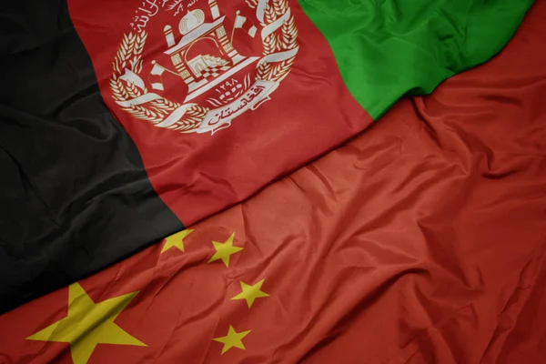 Waving colorful flag of china and national flag of afghanistan. — Stock Photo, Image