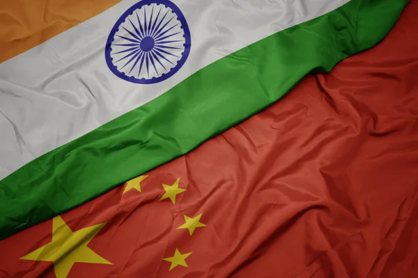 Waving colorful flag of china and national flag of india. — Stock Photo, Image