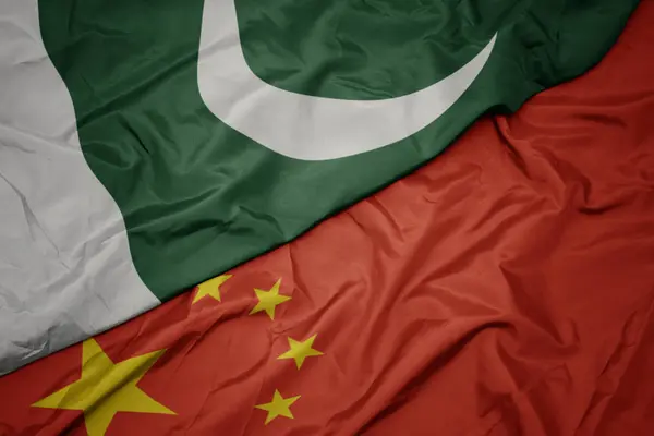 Waving colorful flag of china and national flag of pakistan. — Stock Photo, Image