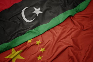 çin ve libya ulusal bayrağı renkli bayrak sallayarak.