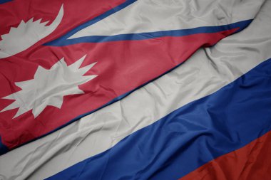 rusya ve nepal ulusal bayrağı renkli bayrak sallayarak.