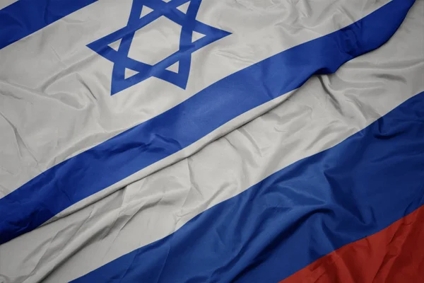 Orosz zászló, és Izrael nemzeti zászlaja. — Stock Fotó