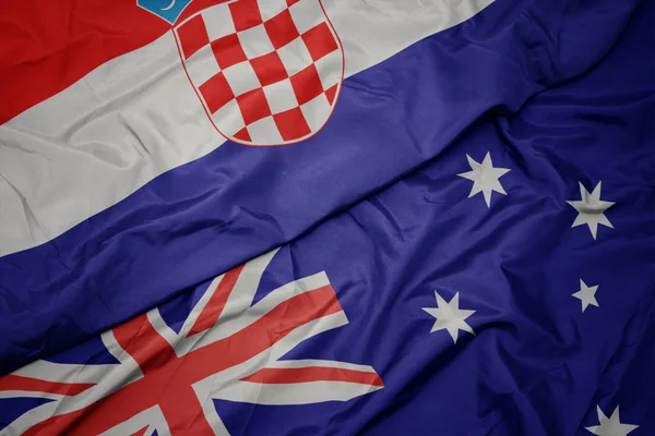 Fluturând steagul colorat al Australiei și drapelul național al Croației . — Fotografie, imagine de stoc