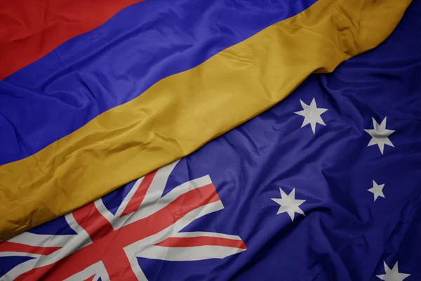 Waving colorful flag of australia and national flag of armenia. — Stock Photo, Image