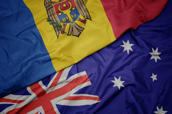 Schwenken bunte australische und moldawische Nationalflagge. — Stockfoto