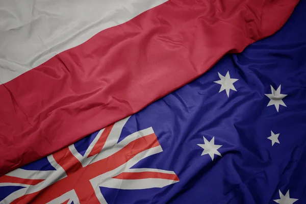 Waving colorful flag of australia and national flag of poland. — Stock Photo, Image