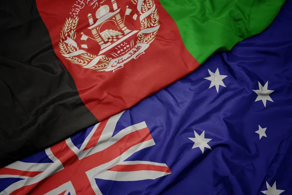 Waving colorful flag of australia and national flag of afghanistan. — Stock Photo, Image