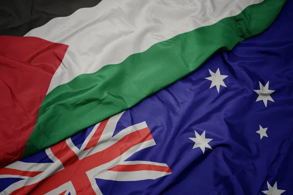 Waving colorful flag of australia and national flag of palestine. — Stock Photo, Image