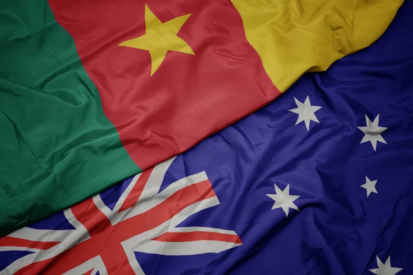 Waving colorful flag of australia and national flag of cameroon. — Stock Photo, Image