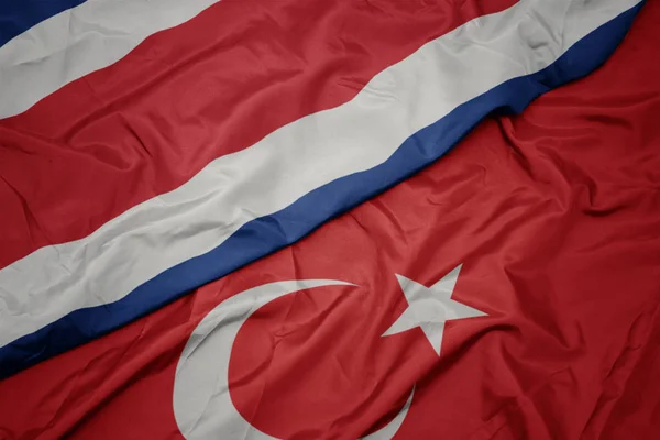 Waving colorful flag of turkey and national flag of costa rica. — Stock Photo, Image