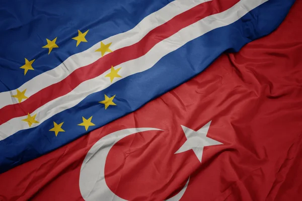 Waving colorful flag of turkey and national flag of cape verde. — Stock Photo, Image