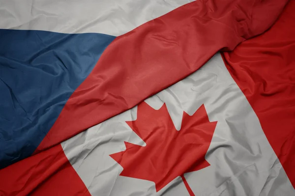 Acenando bandeira colorida do Canadá e bandeira nacional da república checa . — Fotografia de Stock